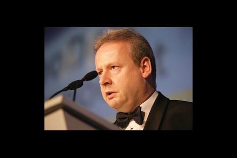 Neil Pennell accepting his award for outstanding achievement